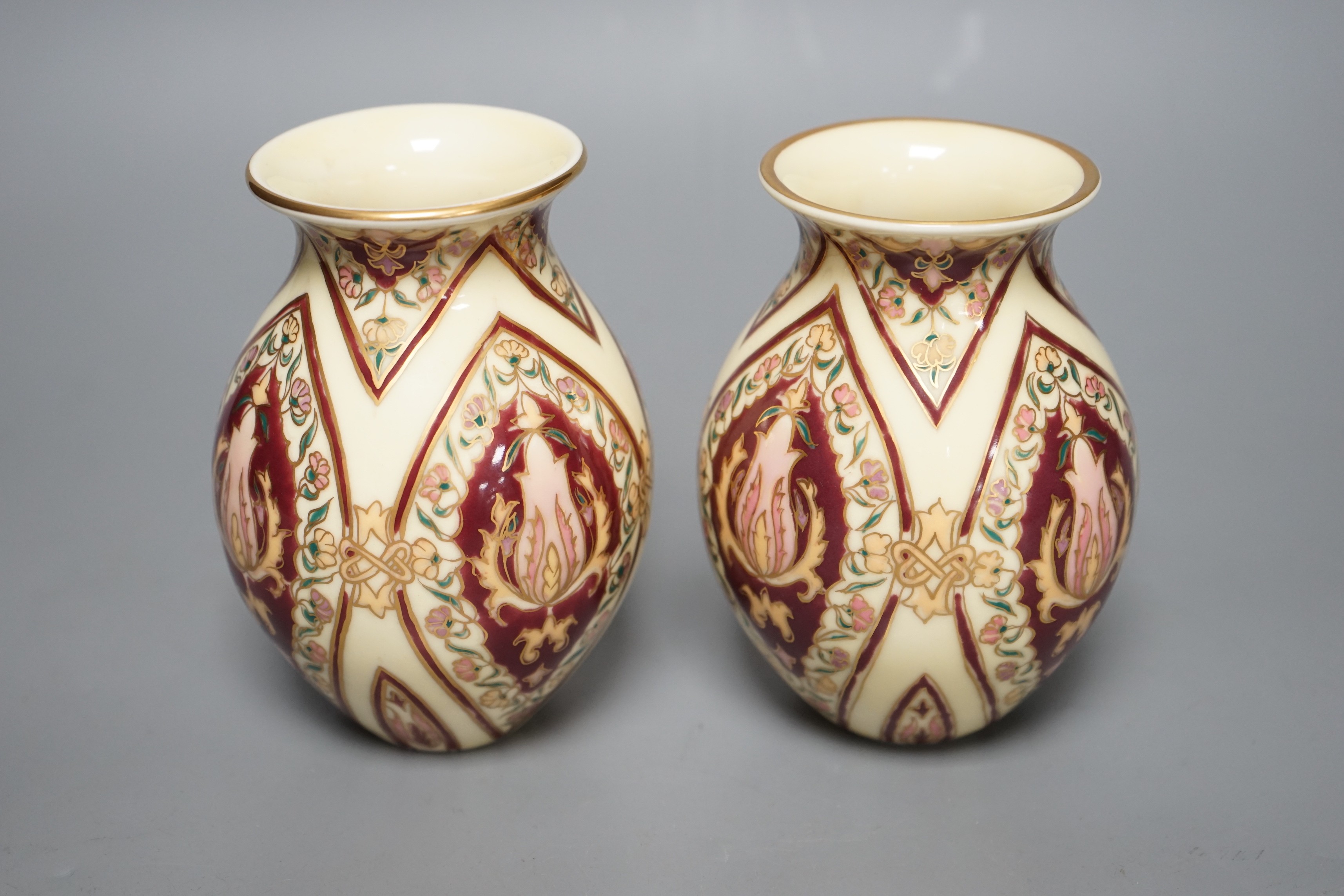A pair of Zsolnay vases, 13cm
